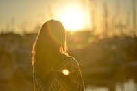 lady standing before sun, free public domain CC0 photo