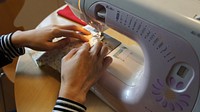 Free seamstress sewing fabric image, public domain CC0 photo.