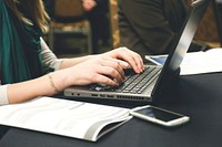 Free woman's hands typing on laptop image, public domain CC0 photo.