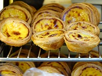 Free egg tart on rack image, public domain dessert CC0 photo.