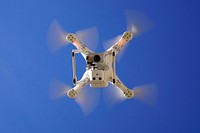 Free close up drone flying in the air image, public domain CC0 photo.