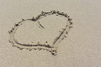 Heart shape on the sand close up, free public domain CC0 photo