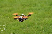 Free drone flying above grass floor image, public domain CC0 photo.