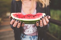 Free woman holding watermelon public domain CC0 photo.