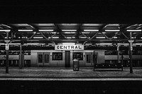 Free train station with central sign image, public domain CC0 photo.