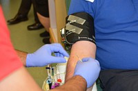 Man donating blood, free public domain CC0 image.