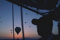 Free watching hot air balloons silhouette image, public domain experience CC0 photo.