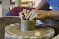 Free person making handmade pottery photo, public domain ceramics CC0 image.