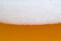 Free beer foam closeup image, public domain alcohol drink CC0 photo.