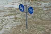 Free flooding road sign in water image, public domain CC0 photo.