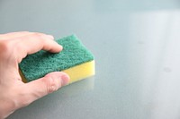 Cleaning glass surface with sponge, free public domain CC0 photo