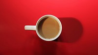 Free coffee mug top view with red background photo, public domain beverage CC0 image.