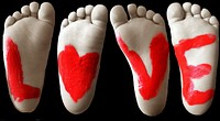 Free love painted on child feet image, public domain CC0 photo.