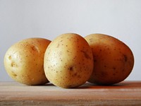 Free close up potato on table image, public domain vegetable CC0 photo.