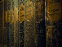 Free old ancient books in shelf photo, public domain CC0 image.