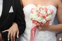 Free bride holding flower bouquet image, public domain CC0 photo.