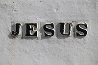 Free Jesus text on white wall image, public domain CC0 photo.