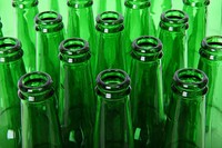 Free green glass bottle close up background public domain CC0 photo.