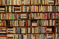 Free library shelves with many books photo, public domain CC0 image.