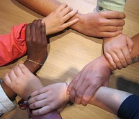 Free people joining hands image, public domain CC0 photo.