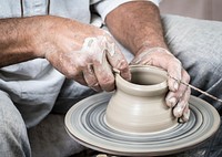 Free person making handmade pottery photo, public domain ceramics CC0 image.