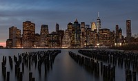 Urban cityscape with skyscrapers night view image, public domain CC0 photo.