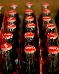 Cokes in bottle crate, Coca Cola soda, location unknown, 02/04/2017