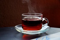 Free hot tea in glass cup on the table photo, public domain beverage CC0 image.