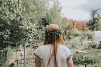 Free blonde woman wearing flower crown image, public domain human CC0 photo.