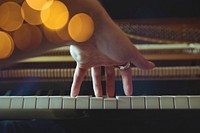 Free playing piano image, public domain musical instrument CC0 photo.