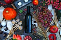 Free red wine bottle flat lay image, public domain drink CC0 photo.