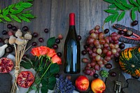 Free red wine bottle flat lay image, public domain drink CC0 photo.