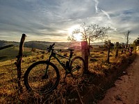 Free cycle in vast land image, public domain landscape CC0 photo.