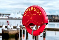 Free lifebuoy by the ocean image, public domain CC0 photo.