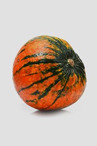 Free orange with green stripes pumpkin closeup image, public domain CC0 photo.