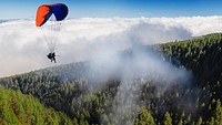 Free parachuting activity above the forest public domain CC0 photo