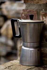 Free metal electric kettle with brick background public domain CC0 photo
