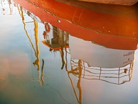 Free reflection of a boat in water image, public domain CC0 photo.