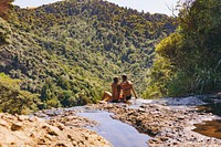 Free person on mountain cliff photo, public domain nature CC0 image.