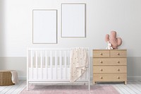 Picture frame mockup psd hanging in nursery room home decor interior