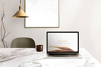 Laptop screen mockup psd on a desk luxury home office zone design