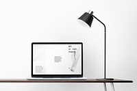 Laptop screen mockup psd on a desk minimal home office zone design