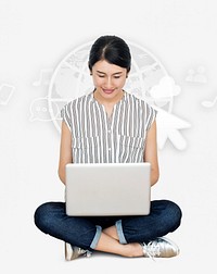 Cheerful Asian woman using a laptop