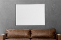 Picture frame mockup psd hanging in a loft living room