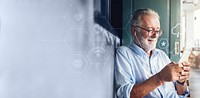 Elderly man watching an online movie from his phone