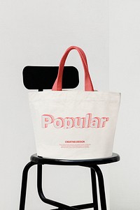 Canvas tote bag mockup psd on black chair