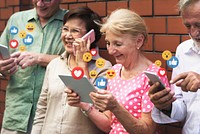 Diverse seniors using digital devices