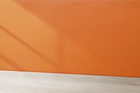 Wooden table product backdrop mockup psd, orange wall design