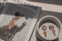 Fashion magazine and earrings, aesthetic photo