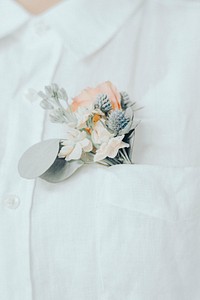 Groom’s white pocket flower, wedding aesthetic photo